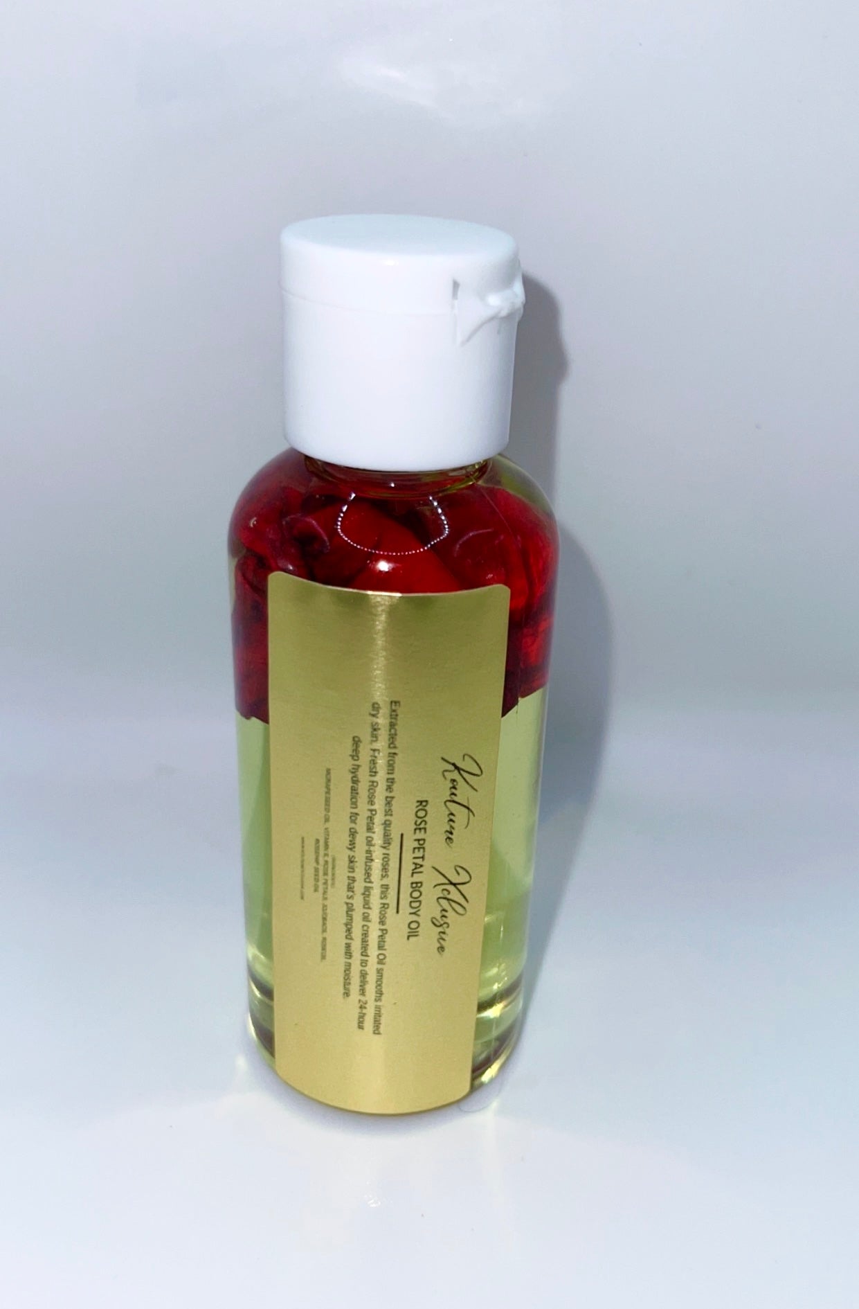 Travel size rose pedal body oil